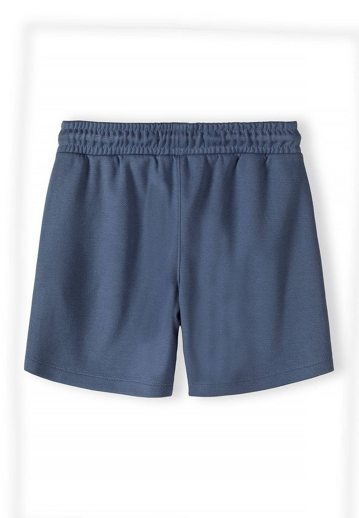 Stijlvolle jongens set met blauwe polo en short