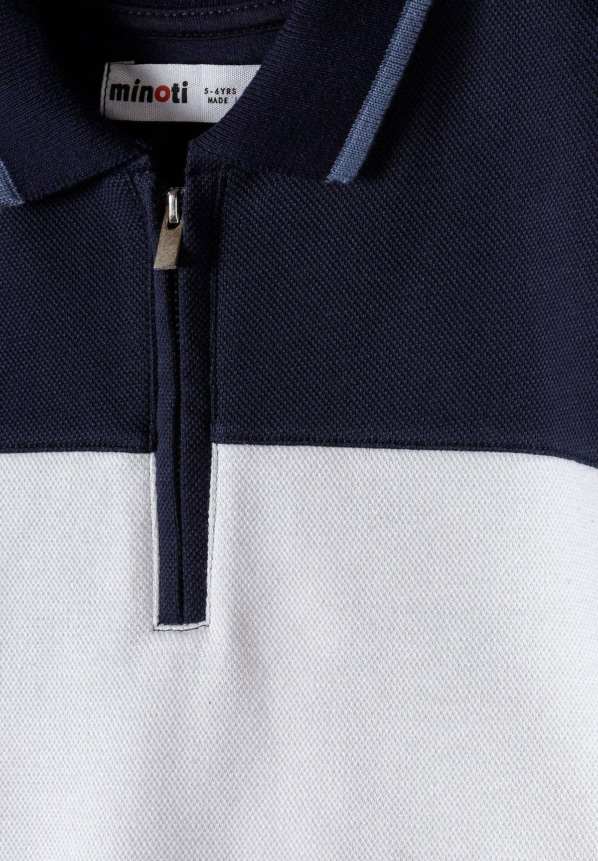 Donkerblauwe kinderset met polo en elastische short