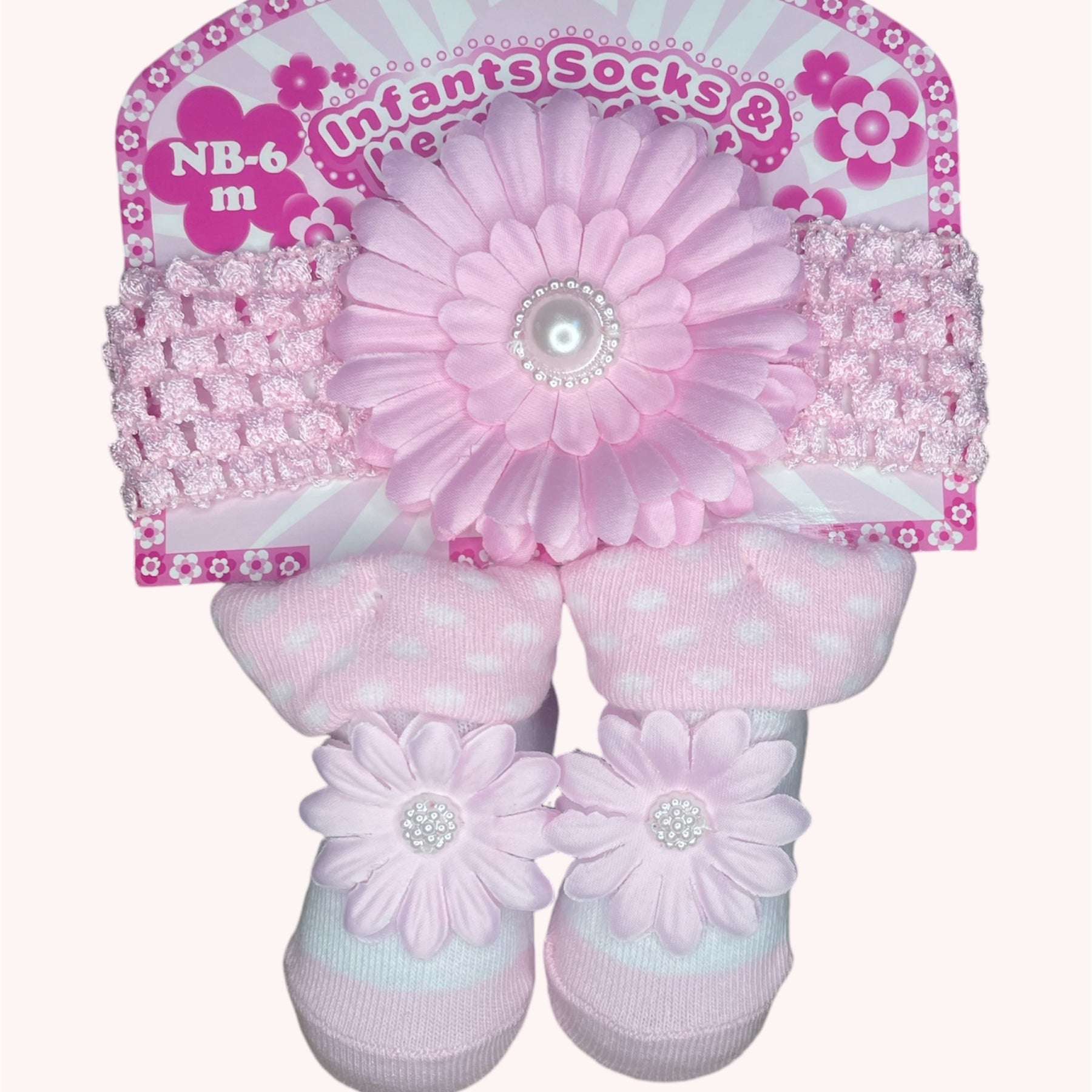 Roze baby haarband en sokjes set met bloem