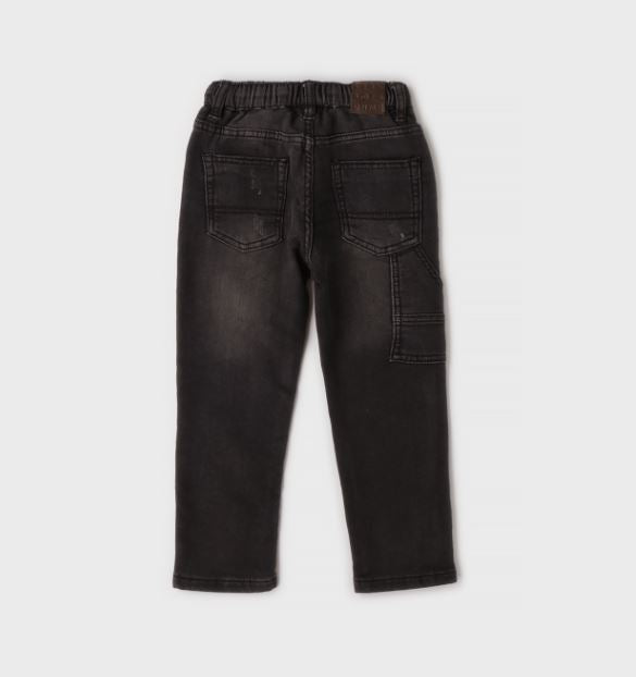 verwassen zwarte iDO jeansbroek jongens met werkzak, achteraanzicht