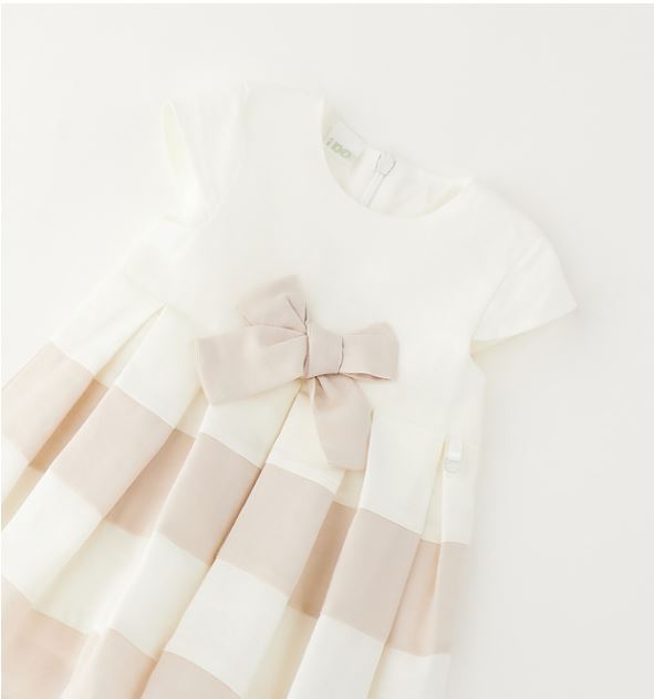 Baby jurk – crème met brede strepen en strik