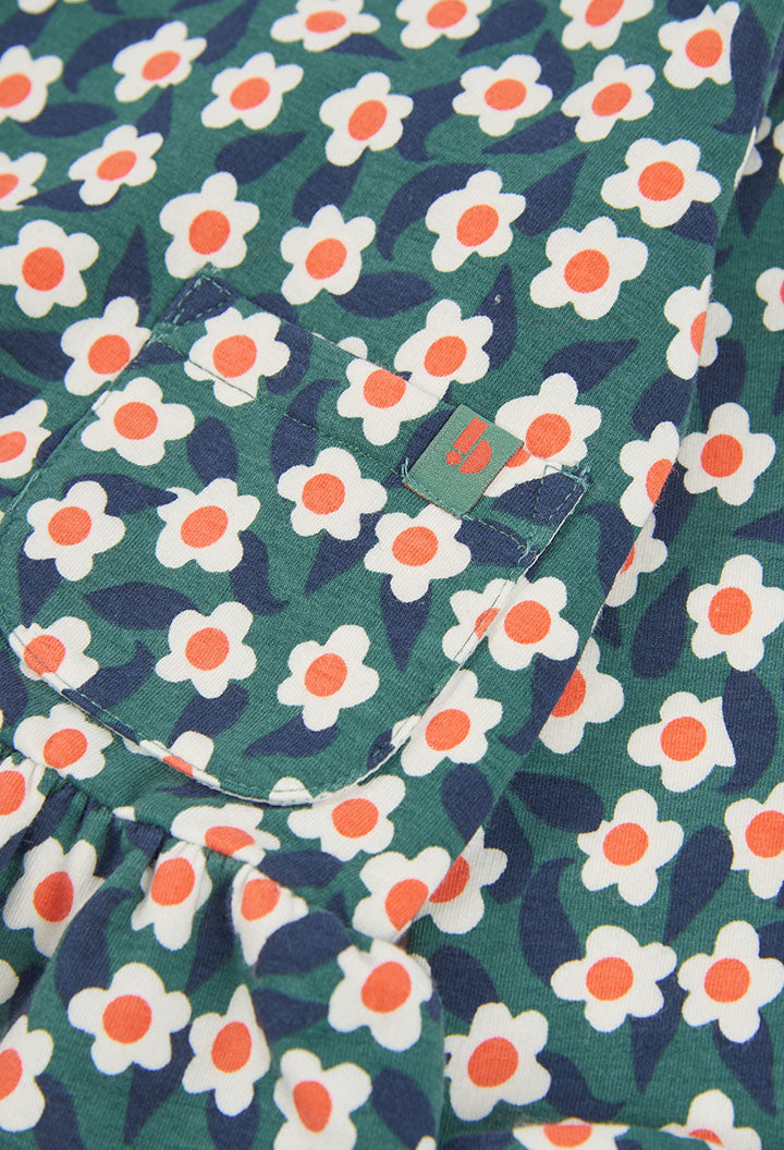detail van de bloemenprint en steekzak op het Boboli sweaterkleedje