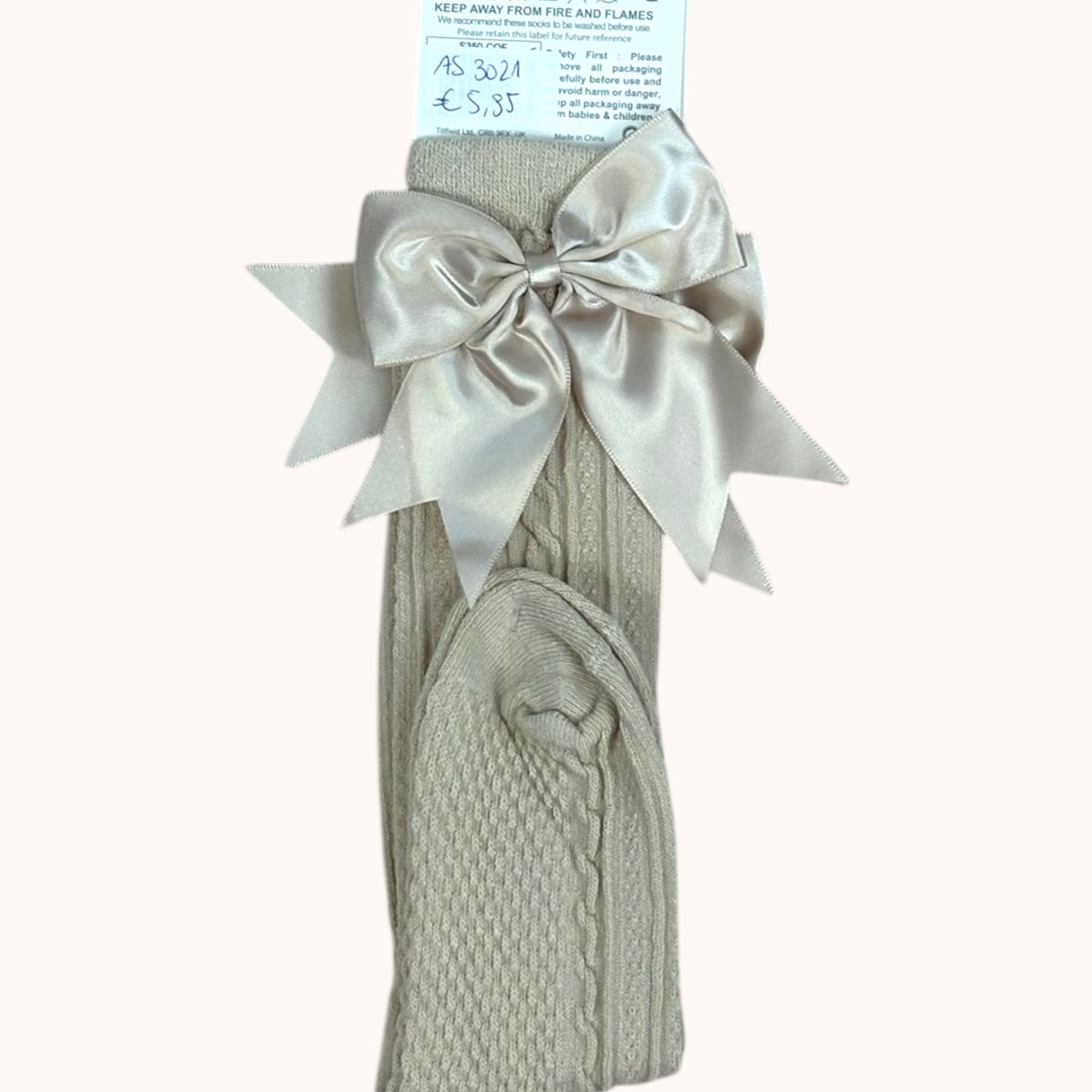 Beige babykousen met grote satijnen strik