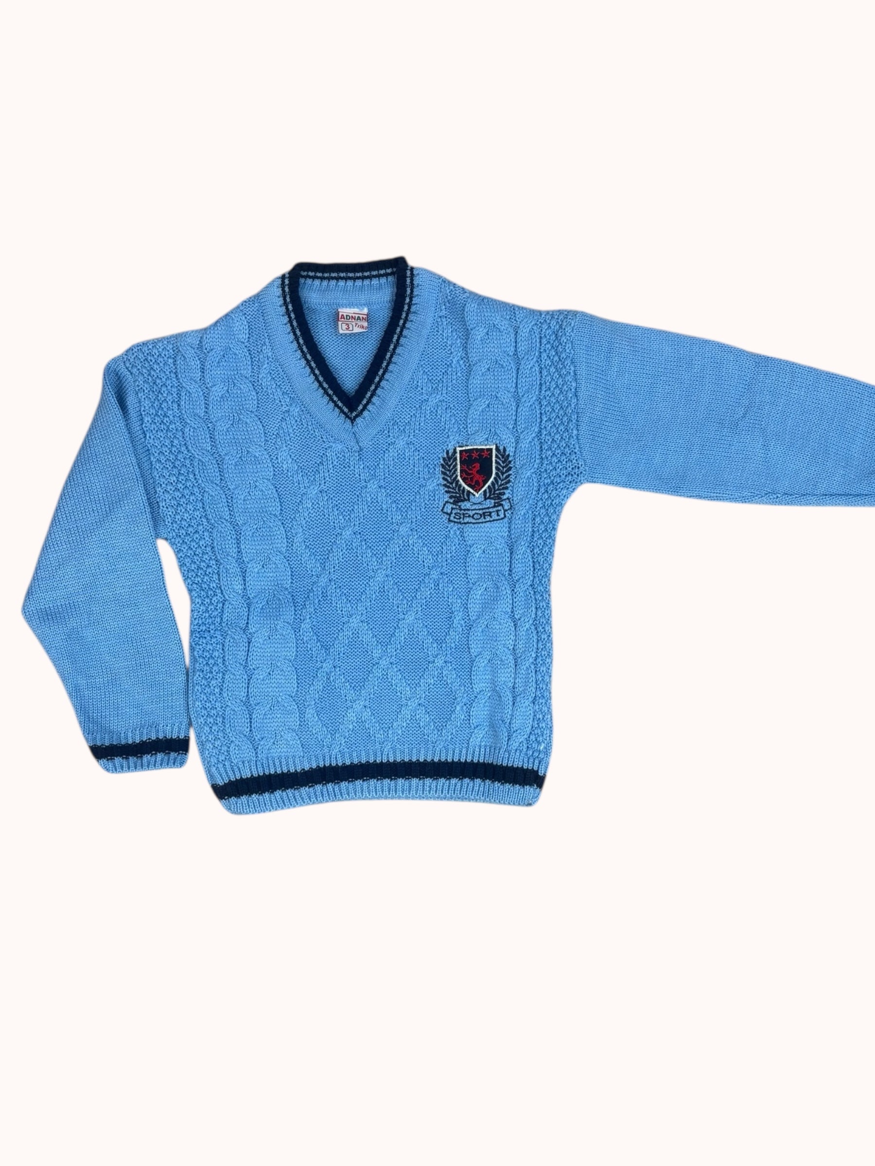 Lichtblauwe jongenstrui met V-hals