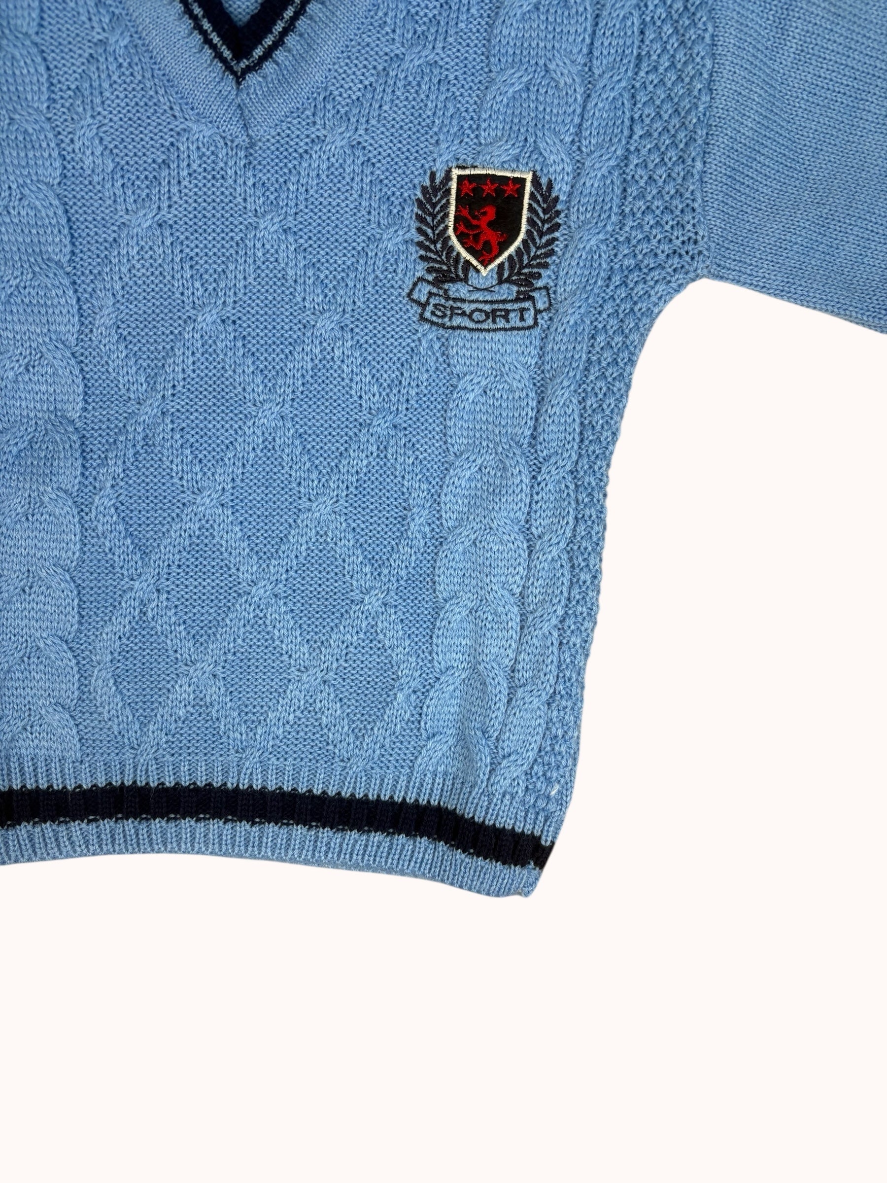 Lichtblauwe jongenstrui met V-hals