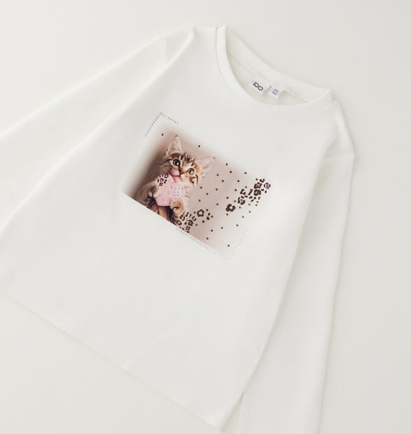 Gebroken wit iDO meisjes longsleeve met katjesprint en glittersteentjes – vooraanzicht