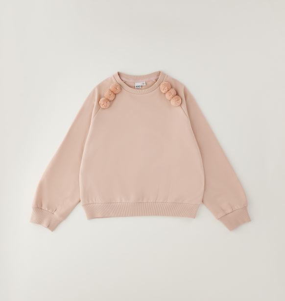 Roze iDO meisjes sweater met pompons op de schouder – vooraanzicht